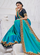 Load image into Gallery viewer, Buy fantastic aqua blue colored partywear silk base saree
