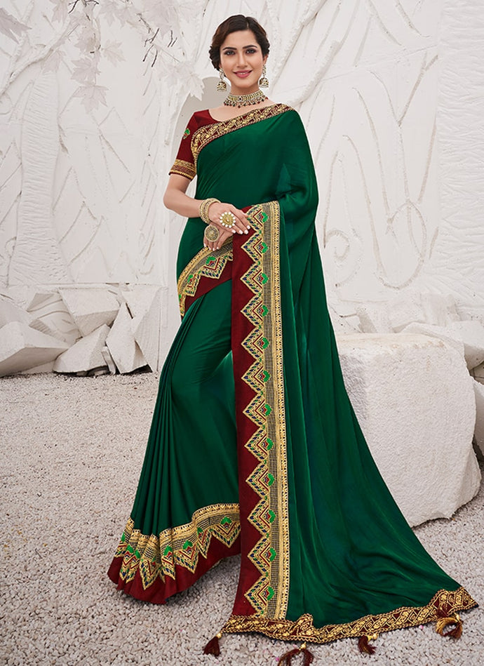 trendy sea green colored partywear silk base saree