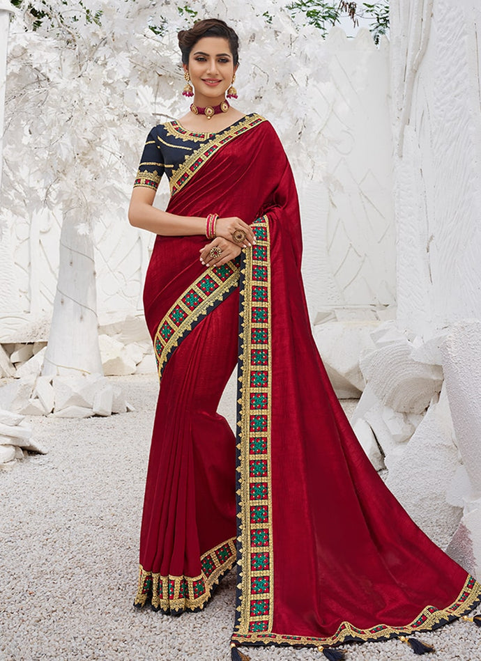 trendy red colored partywear silk base designer saree
