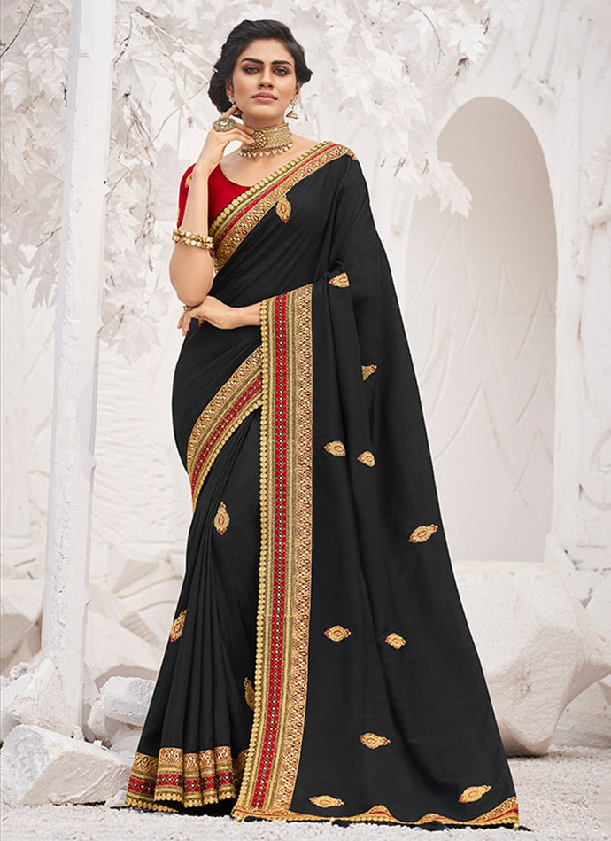 fabulous black colored partywear silk base saree