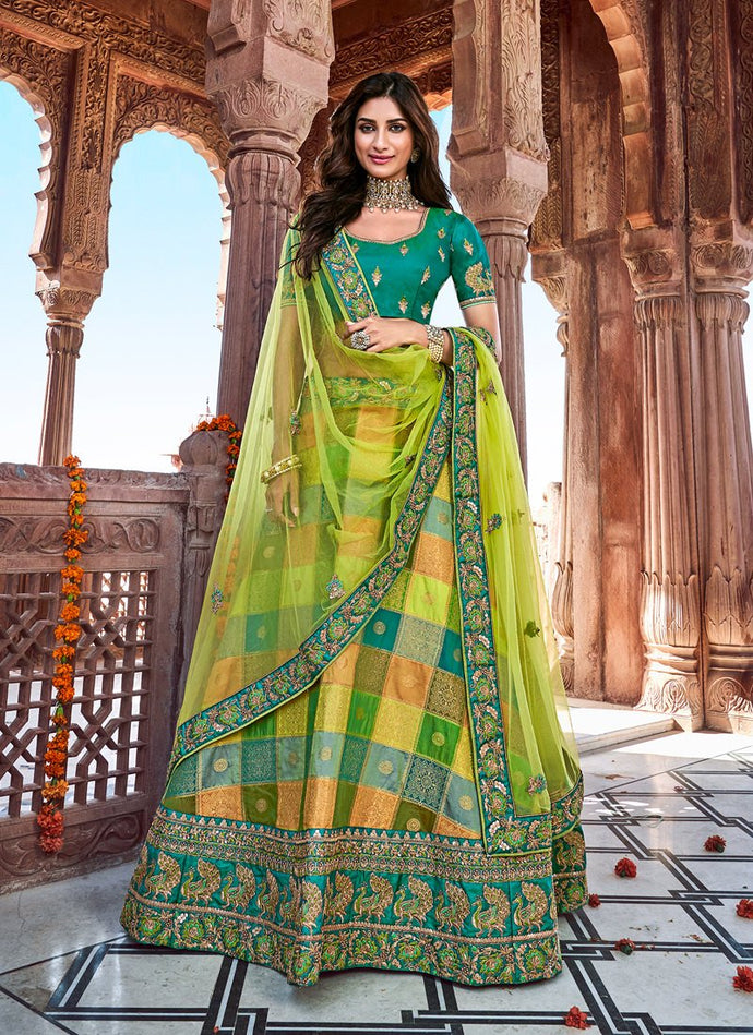 stunning traditional wear embroidered green colored silk base lehenga choli
