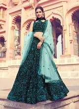 Load image into Gallery viewer, Dashing black color lehenga with turquoise blue dupatta
