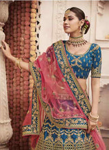 Load image into Gallery viewer, shop blue marvelous bridalwear heavy work silk base lehenga choli
