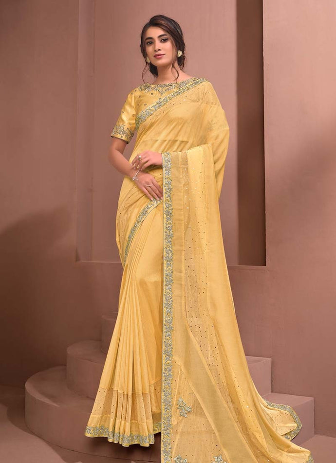 Astonishing Yellow Color Silk Fabric Zari and Sequins work Saree