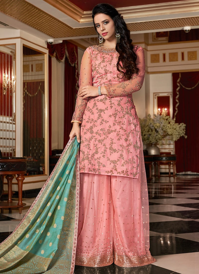 phenomenal pastel pink colored georgette base sharara suit
