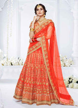 Load image into Gallery viewer, Shop Orange Color heavy worked with silk base lehenga choli
