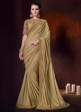 Load image into Gallery viewer, rich look beige colored georgette silk base heavy work saree
