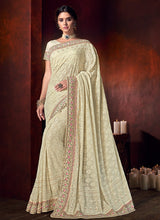 Load image into Gallery viewer, creamy cream colored partywear georgette base saree
