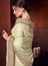 Load image into Gallery viewer, Online creamy cream colored partywear georgette base saree
