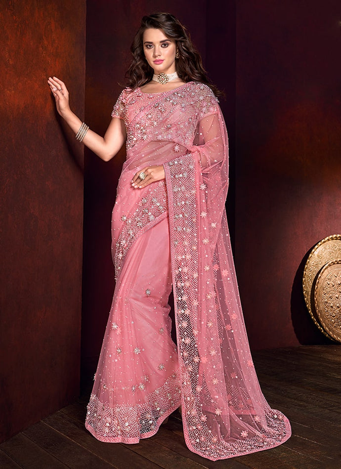admirable pastel pink colored stone work partywear saree