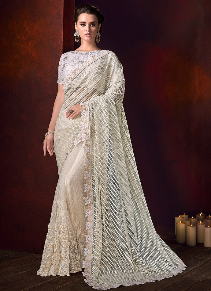 beautiful cream colored georgette base partywear saree