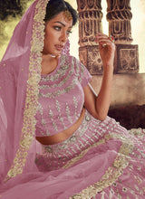 Load image into Gallery viewer, Buy delightful purple color soft net base heavy embroidery work lehenga choli
