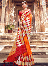 Load image into Gallery viewer, Buy orange colored silk base with designer blouse banarasi  saree
