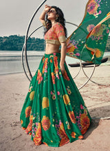 Load image into Gallery viewer, buy Latest Rama green colored partywear crop top umbrella lehenga choli
