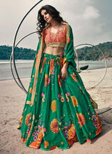 Load image into Gallery viewer, Latest Rama green colored partywear crop top umbrella lehenga choli
