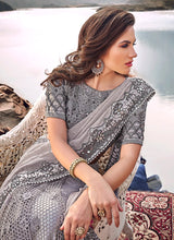 Load image into Gallery viewer, Buy extraordinary grey colored georgette silk base saree
