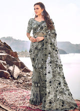 Load image into Gallery viewer, classy grey colored heavy work soft net base saree
