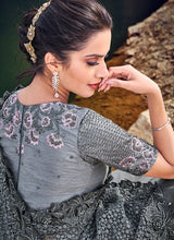 Load image into Gallery viewer, Shop glowing grey colored stone worked soft net base saree
