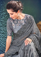 Load image into Gallery viewer, Buy glowing grey colored stone worked soft net base saree
