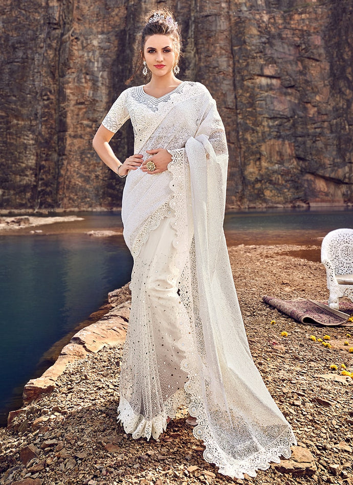 extraordinary white colored partywear soft net base saree