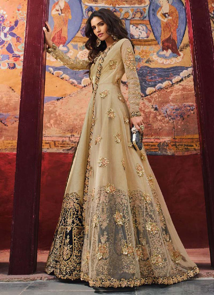 Royal beige colored heavy Zari worked jacket style designer gown
