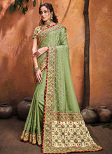 Load image into Gallery viewer, grateful Green colored heavy work designer silk saree
