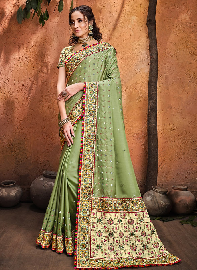 grateful Green colored heavy work designer silk saree