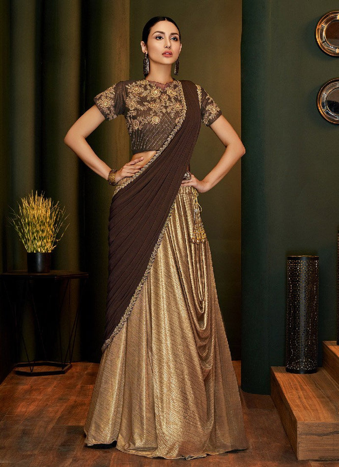 Glorious brown colored silk base saree with designer blouse