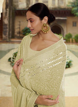 Load image into Gallery viewer, buy Artistic Georgette Silk base Pista Green color Saree with Thread And Mirror work
