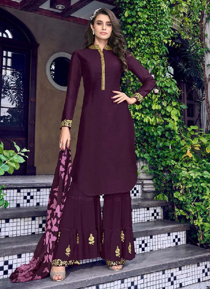 Magnificent Wine colored Zari worked sharara suit