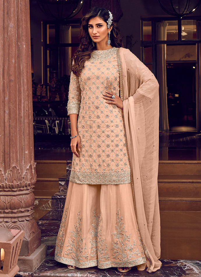 cream colored stone and Zari worked festive wear sharara suit