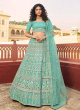 Load image into Gallery viewer, Sequins And Zari Work Turquoise Color Organza Fabric Lehenga Choli
