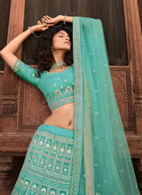 Load image into Gallery viewer, Shop Sequins And Zari Work Turquoise Color Organza Fabric Lehenga Choli

