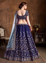 Load image into Gallery viewer, buy navy blue colored weddingwear heavy work embroidered lehenga choli
