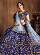 Load image into Gallery viewer, shop navy blue colored weddingwear heavy work embroidered lehenga choli
