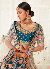 Load image into Gallery viewer, buy turquoise blue colored weddingwear silk base heavy work lehenga choli
