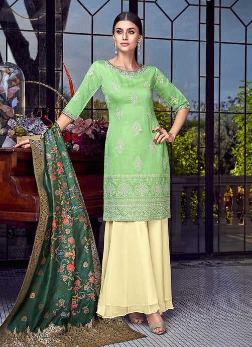 Graceful Light Green color Silk base Sharara salwar suit with Lucknowi work
