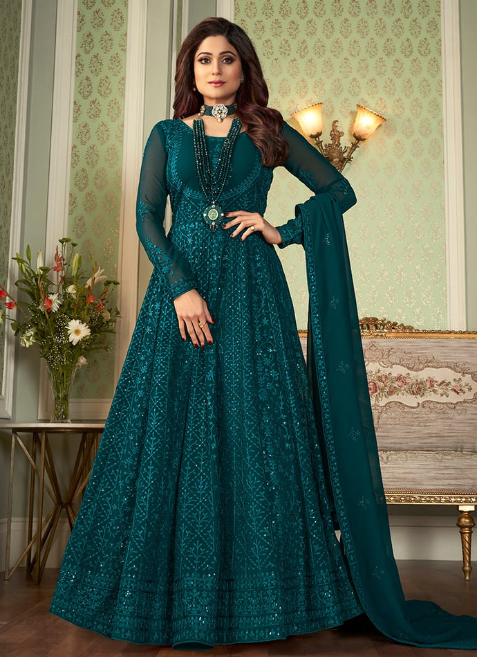 glamorous turquoise blue colored georgette base gown