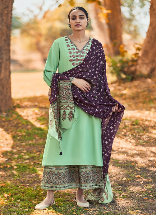 Angel sleeved light green colored thread work palazzo suit