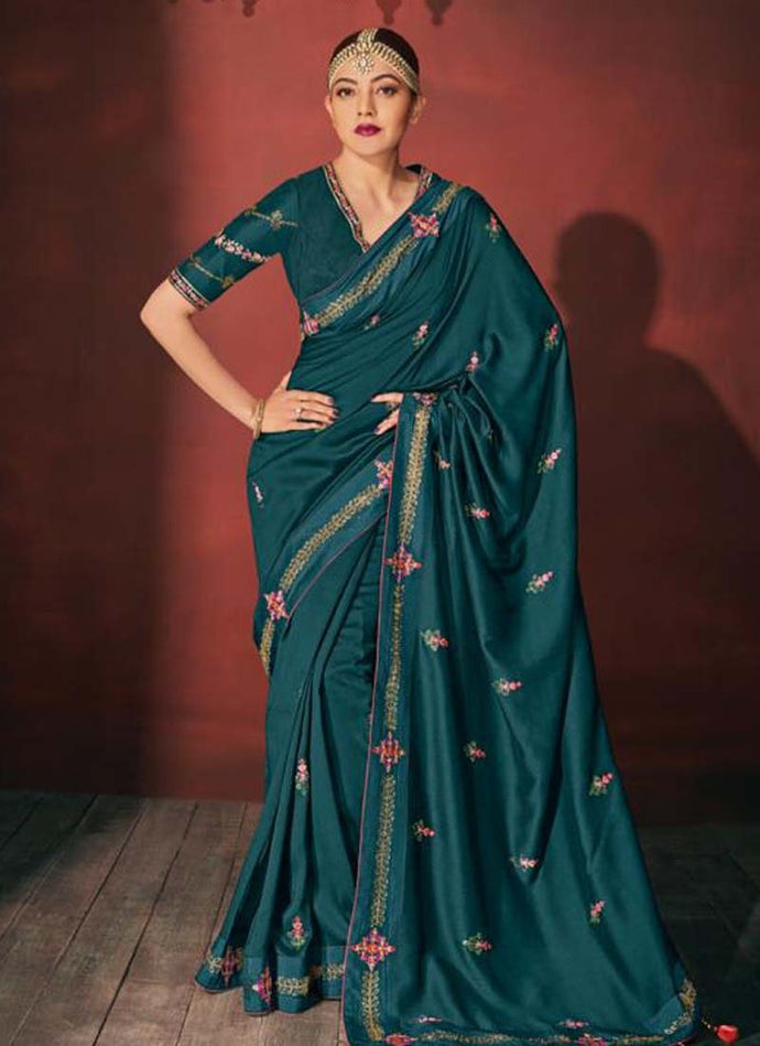 Rama green colored resham worked designer partywear V neck saree