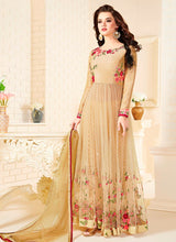 Load image into Gallery viewer, Online beautiful beige colored partywear designer slit cut suit
