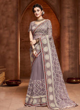 Load image into Gallery viewer, tremendous grey colored embroidered soft net base saree
