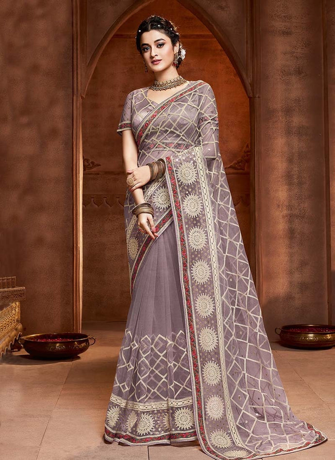 tremendous grey colored embroidered soft net base saree