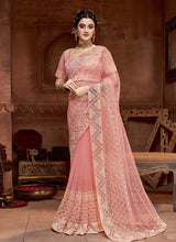 Load image into Gallery viewer, Wondrous baby pink colored embroidered soft net base saree
