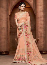 Load image into Gallery viewer, Amusing Coral Peach Colored Embroidered Soft Net Base Partywear Saree
