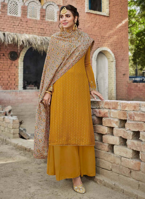 buy mustard colored georgette base Punjabi suit with heavy work dupatta