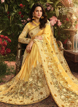 Load image into Gallery viewer, lemon yellow colored partywear heavy work soft net base saree
