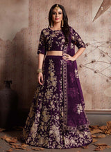 Load image into Gallery viewer, buy purple stylish weddingwear heavy work embroidery velvet base lehenga choli
