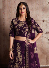 Load image into Gallery viewer, shop purple stylish weddingwear heavy work embroidery velvet base lehenga choli
