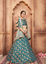 Load image into Gallery viewer, Buy Marvelous Teal Green Color Silk base Heavy Embroidred Lehenga Choli
